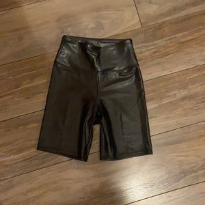 Shiny black biker shorts